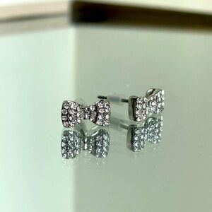 Silver bowtie stud earrings